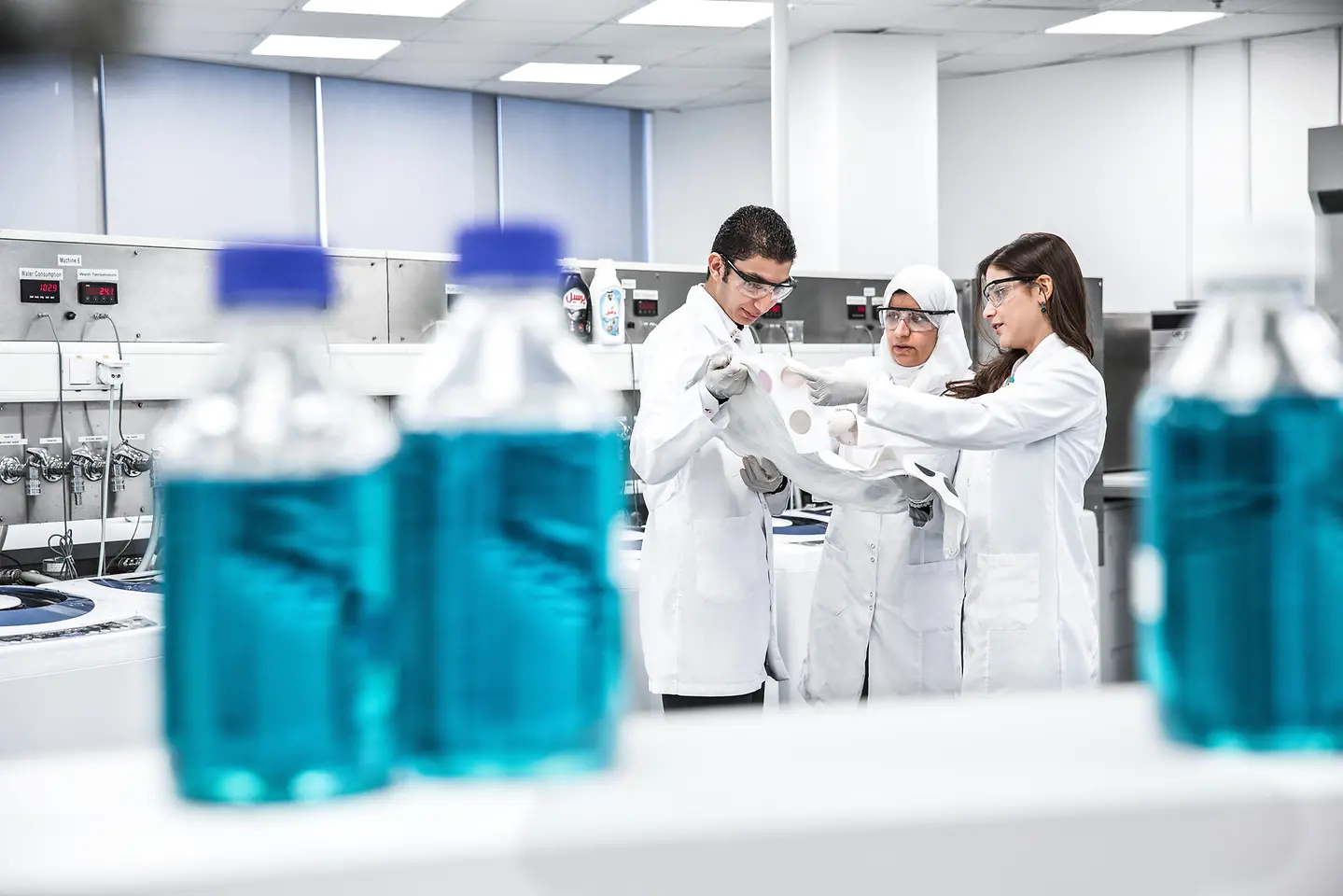 Three researchers in the Innovation Center in Dubai.